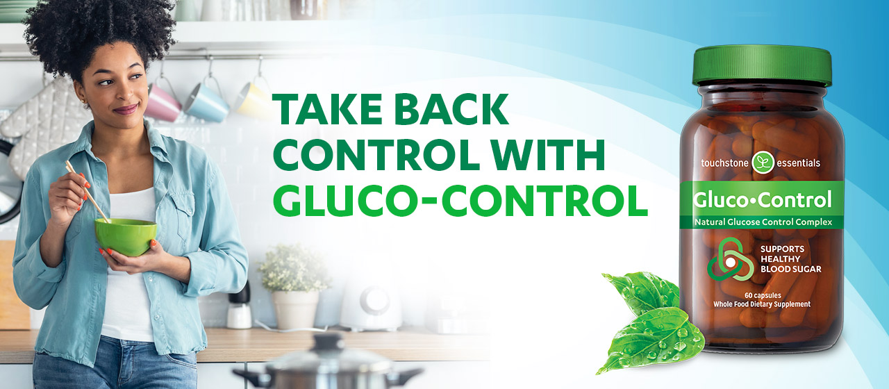 Woman looking at bottle of Gluco-Control